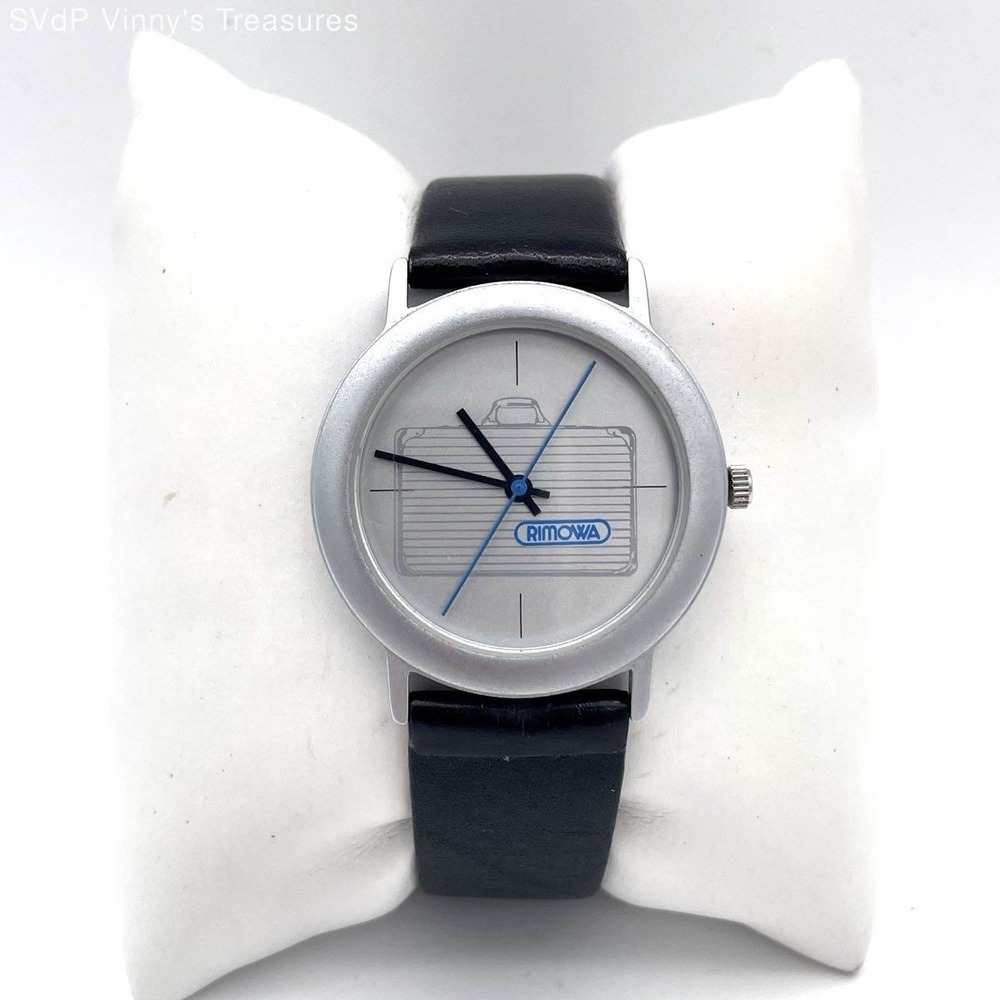 Rimowa Unisex Quartz Watch Silver Suitcase Graphic Dial Black Leather Strap